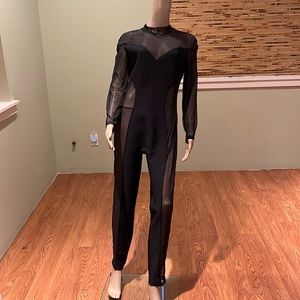 Akira Black Jumpsuit With Sheer  Net Cutouts On The Sides Size XL